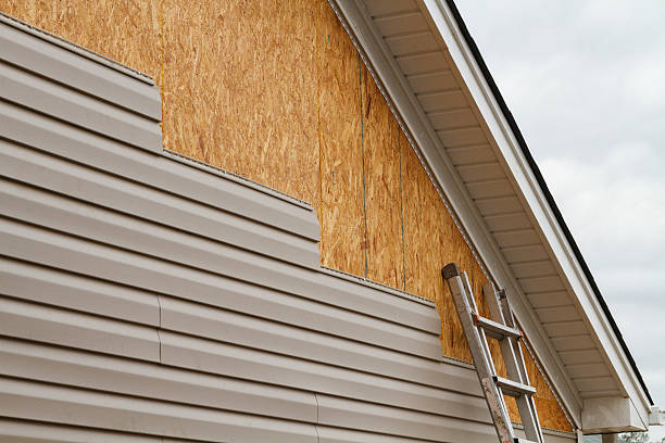 Professional Fiber Cement Siding technician working in Arlington, MA